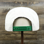 The backside of the Throwback Philadelphia Eagles Corduroy Snapback Hat | White Corduroy Snap Cap