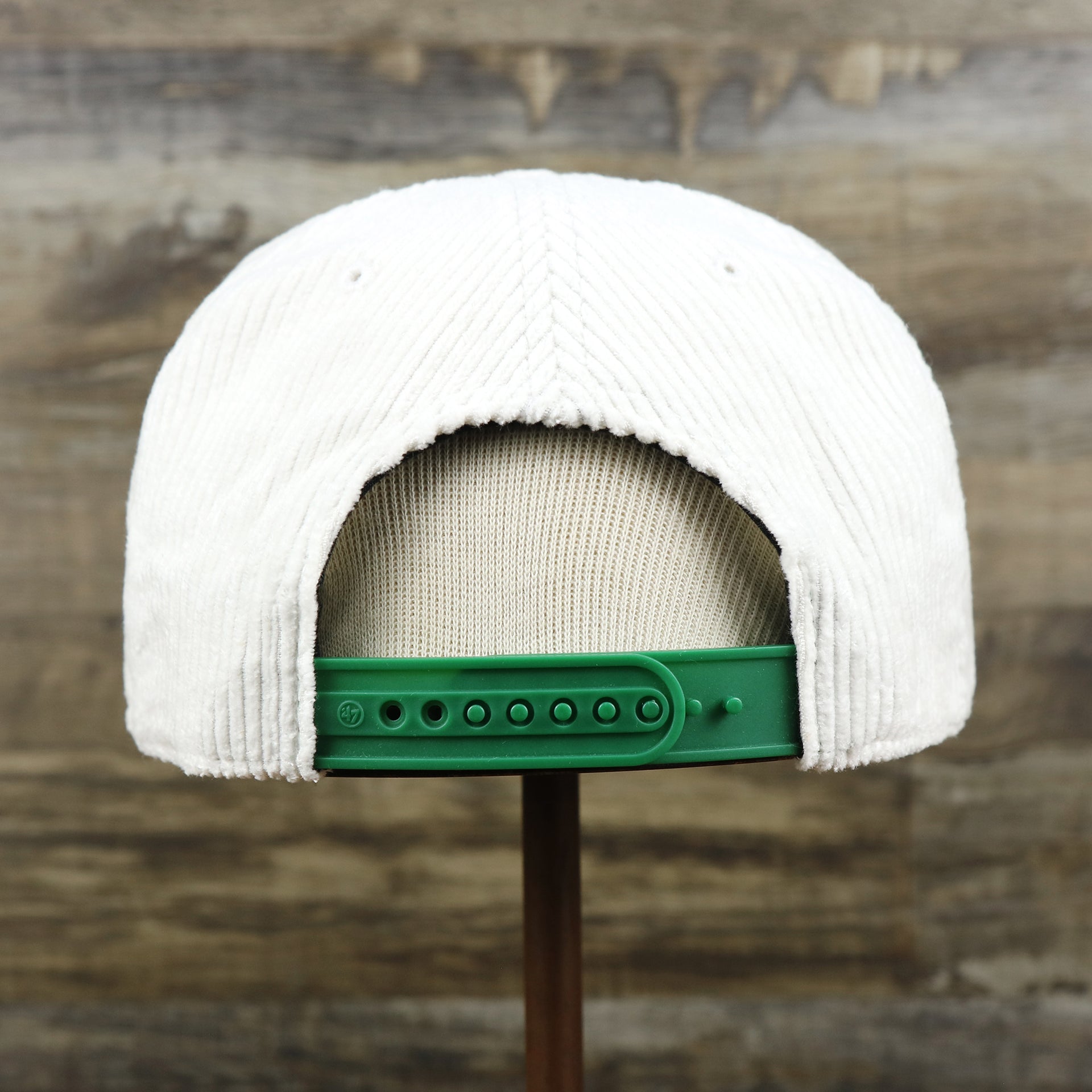 The backside of the Throwback Philadelphia Eagles Corduroy Snapback Hat | White Corduroy Snap Cap