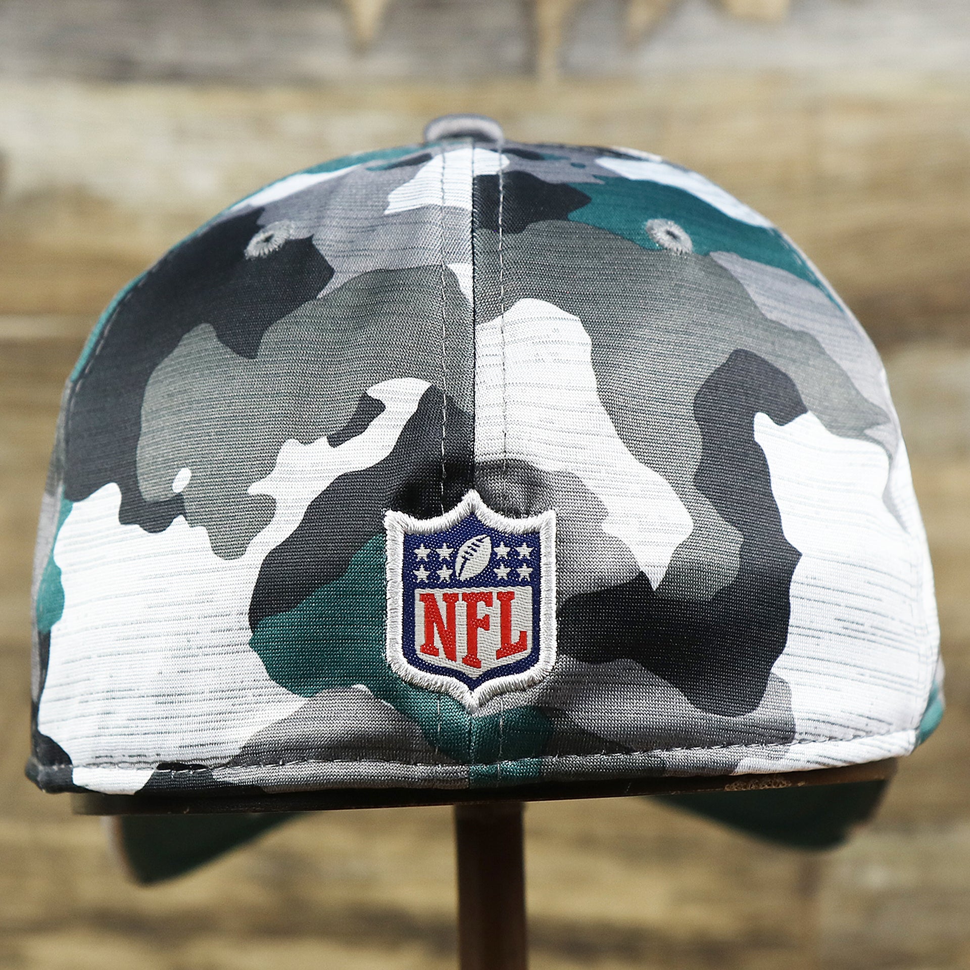 The backside of the Philadelphia Eagles Summer Training 2022 Camo 39Thirty FlexFit Cap | Midnight Green Camo 39Thirty Cap