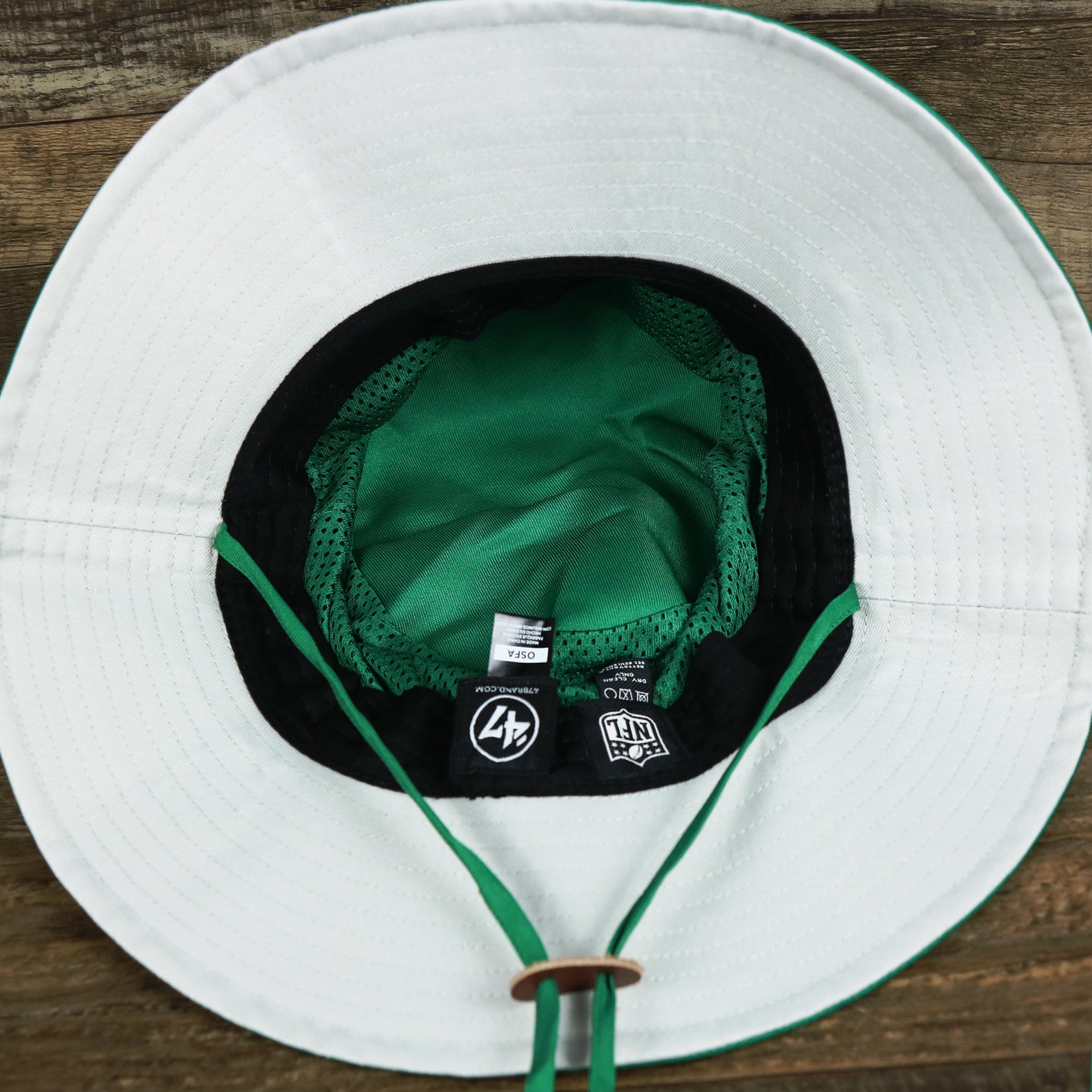 The undervisor on the Throwback Philadelphia Eagles 1987 White Eagles Logo Panama Pail Bucket Hat | Kelly Green Bucket Hat