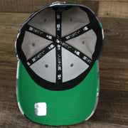 The underside of the Throwback Philadelphia Eagles OnField NFL Summer Training 2022 39Thirty Camo FlexFit Cap | New Era Kelly Green