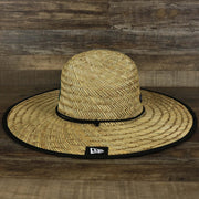 The wearer's left on the Philadelphia Eagles On Field 2022 Summer Training Straw Hat | New Era OSFM
