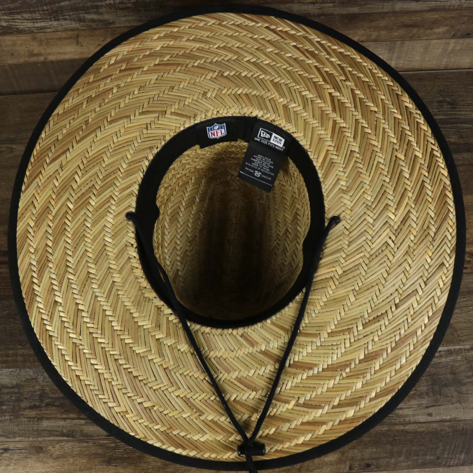 The underside of the Philadelphia Eagles On Field 2022 Summer Training Straw Hat | New Era OSFM