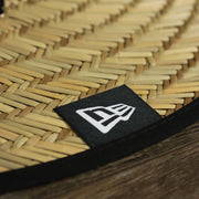 The New Era tag on the Philadelphia Eagles On Field 2022 Summer Training Straw Hat | New Era OSFM