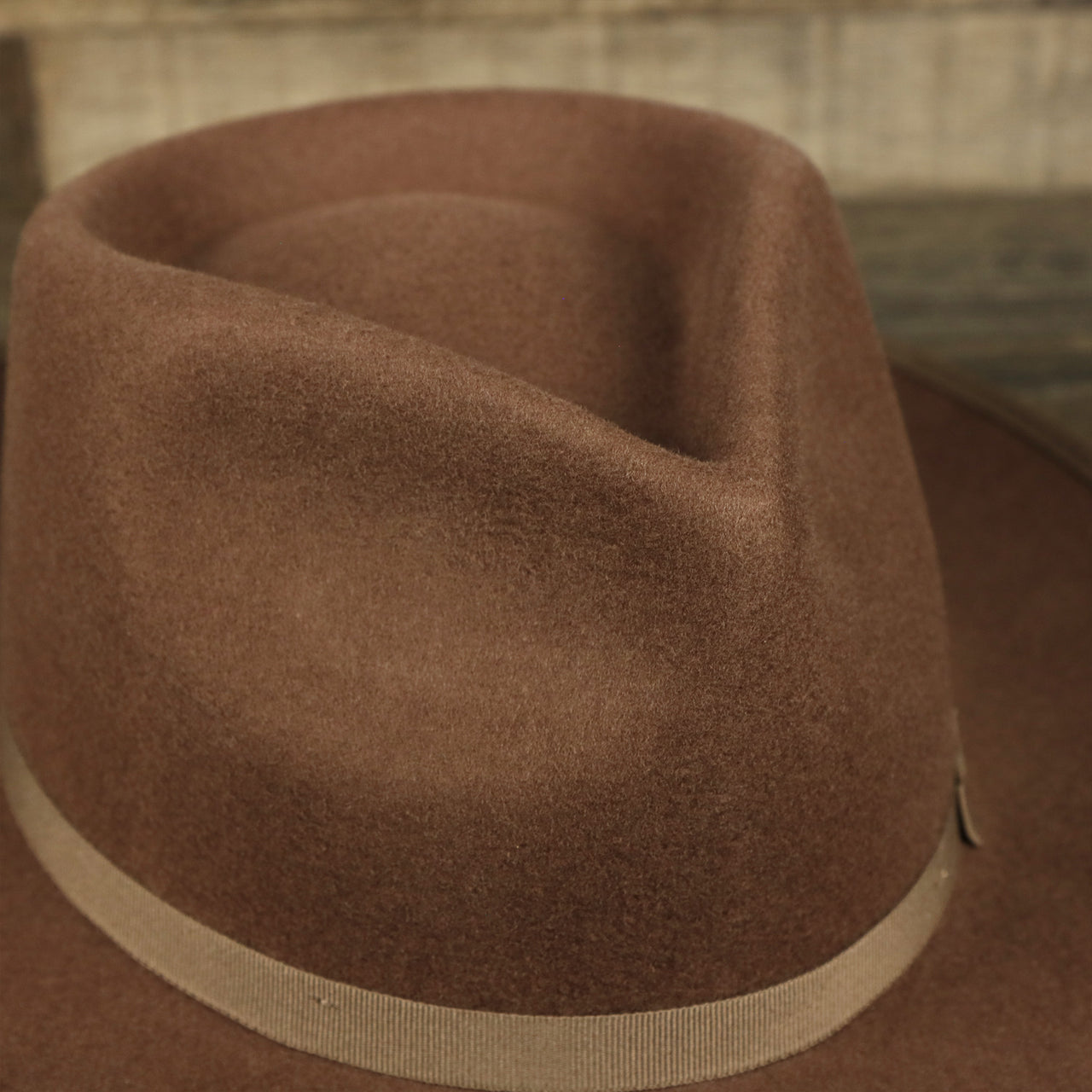 The crown on the Wide Brim Raw Edge Walnut Fedora Hat with Brown Paisley Silk Interior | Zertrue 100% Australian Wool