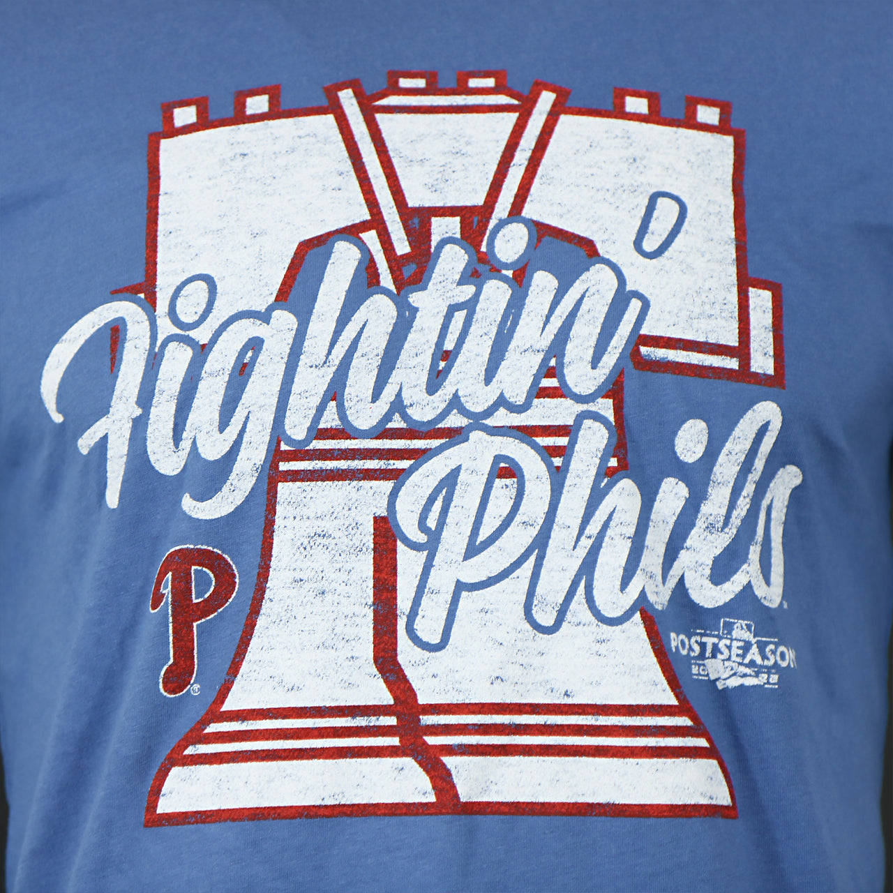 faded distressed liberty bell, the words Fightin Phils, and the postseason logo on the Philadelphia Phillies 2022 World Series Fightin' Phils Liberty Bell Premium Franklin Cadet Blue T-Shirt