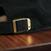 The metallic buckle on the Philadelphia Flyers Black Dad Hat | 47 Brand OSFM