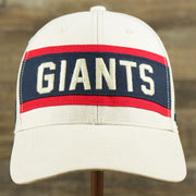 The front of the Throwback New York Giants Striped Wordmark Legacy Giants Side Patch Crossroad Dad Hat | Bone Dad Hat