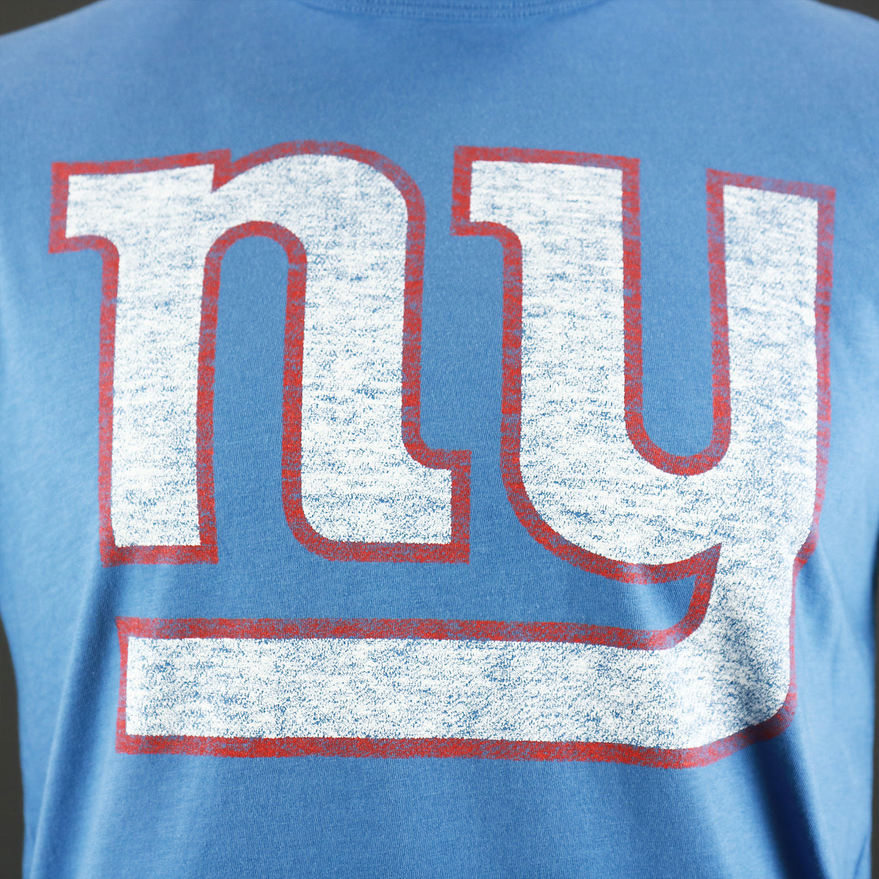 The Giants Logo on the New York Giants Premier Franklin Worn Printed Giants Logo Tshirt | Cadet Blue Tshirt