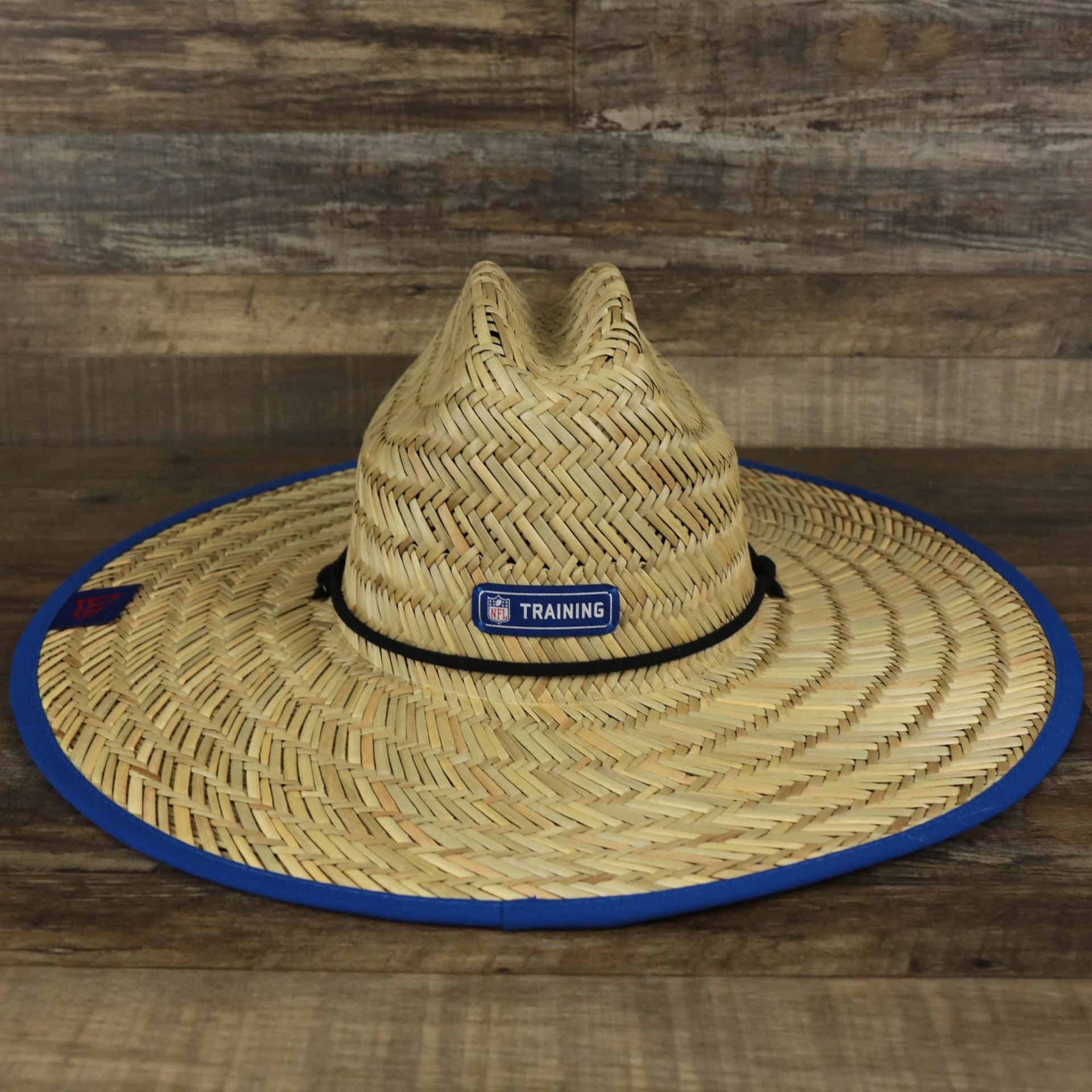 The backside of the New York Giants On Field 2021/2022 Summer Training Straw Hat | New Era OSFM