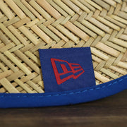 The New Era tag on the New York Giants On Field 2021/2022 Summer Training Straw Hat | New Era OSFM