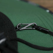 The adjustable chin strap on the
