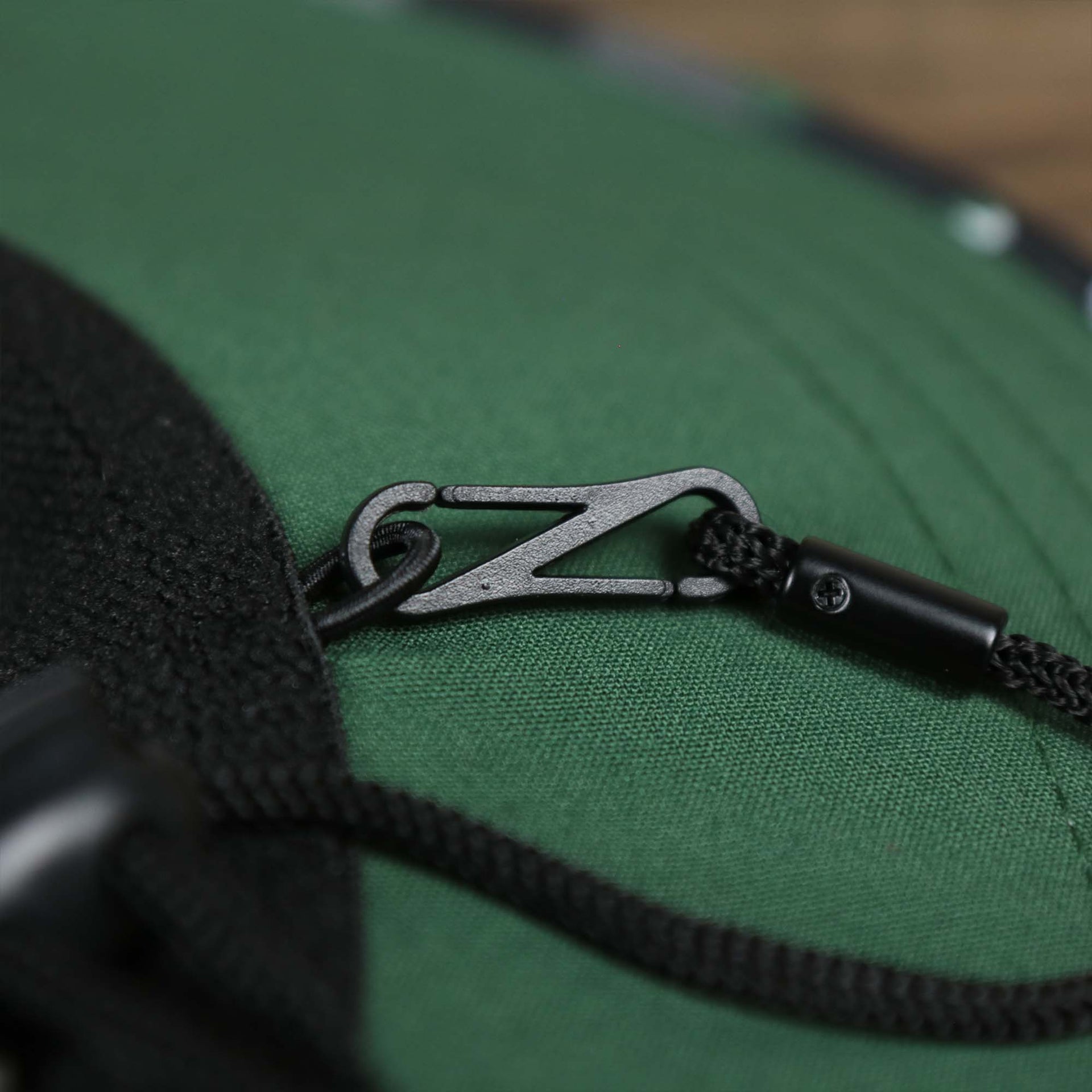 The adjustable chin strap on the