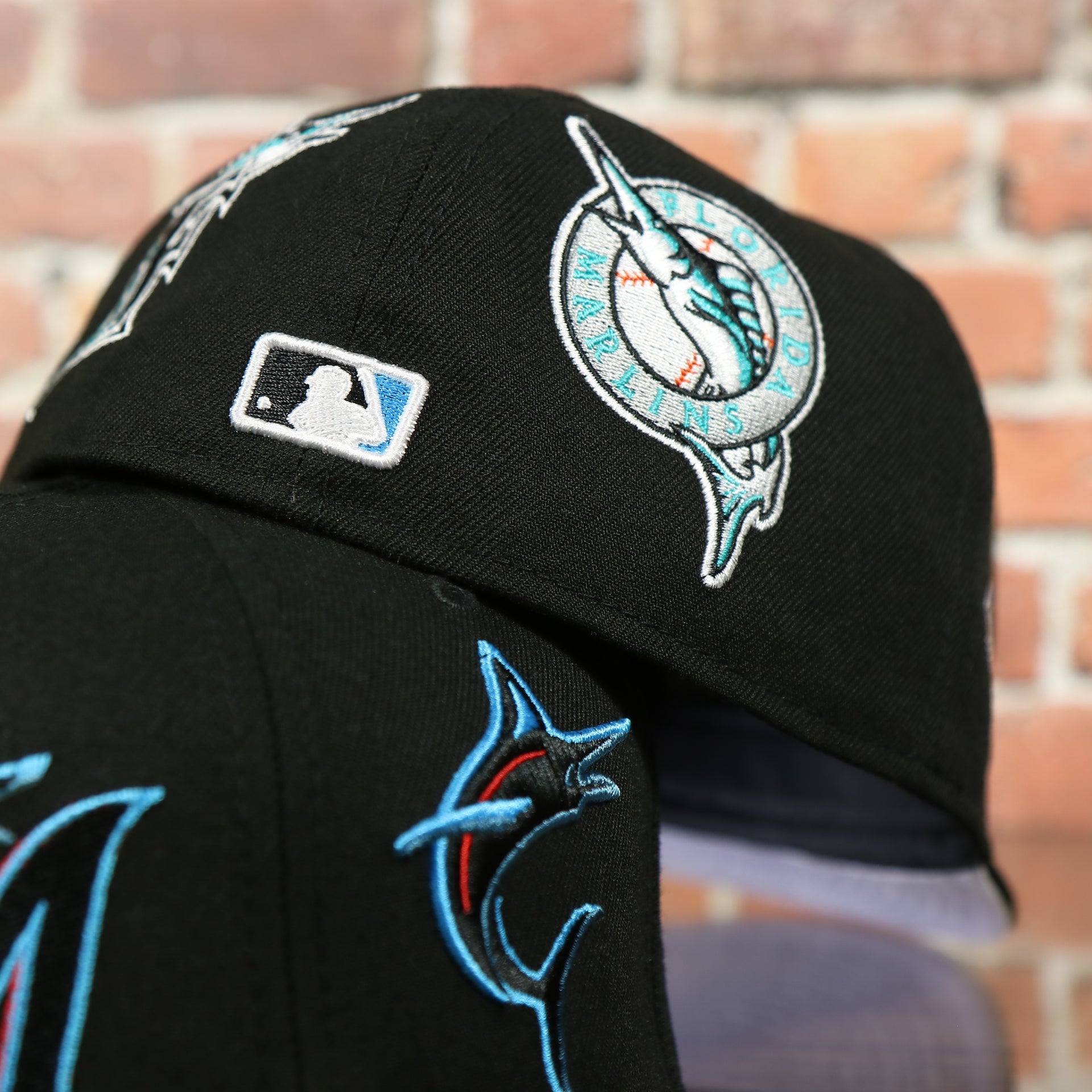 back side of the Miami Marlins "Patch Pride" All Over Gray Bottom Side Patch 59Fifty Fitted Cap