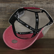 The underside of the Philadelphia Phillies New Era 9Twenty Washed Trucker hat