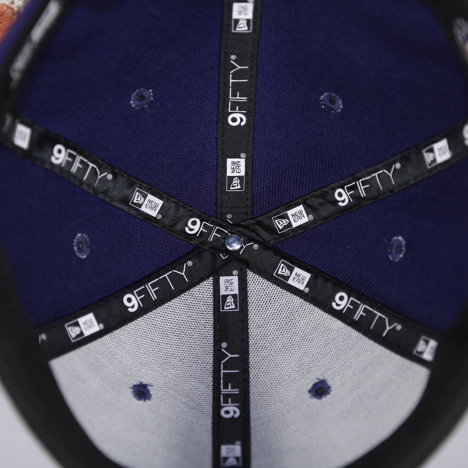 taping on the inside of the Tampa Bay Rays MLB Upside Down Logo 9FIFTY Navy Snapback | OSFM