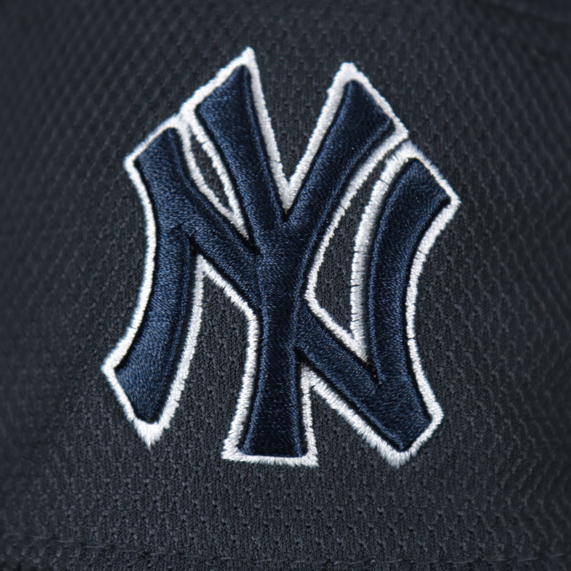 A close up of the Yankees logo on the New York Yankees MLB 2022 Spring Training Onfield Bucket Hat