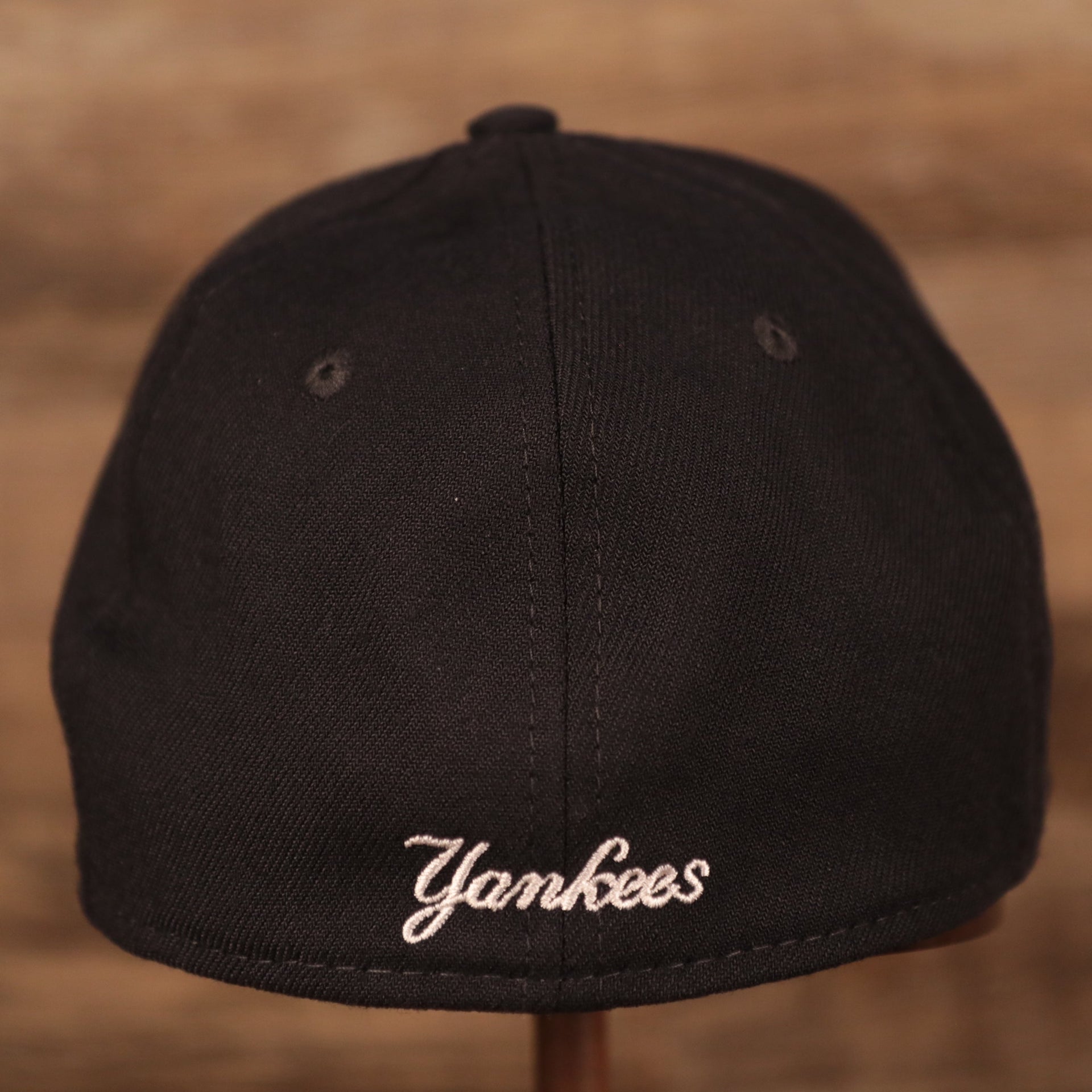 The light blue Yankees patch on the backside of the New York Yankees MLB on field fathers day 39Thirty cap by New Era.