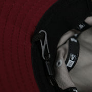 A close up of the removeable chin strap on the Philadelphia Phillies Cooperstown New Era Bucket Hat