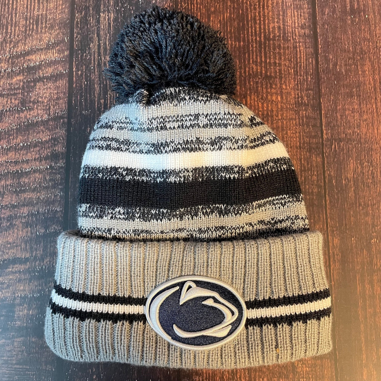 The front of the Penn State Nittany Lions 2022 Youth Beanie features a Penn State Nittany Lions logo at the front raised cuff
