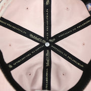 interior of the Cleveland Cavaliers Micro Suede Pink Dad Hat