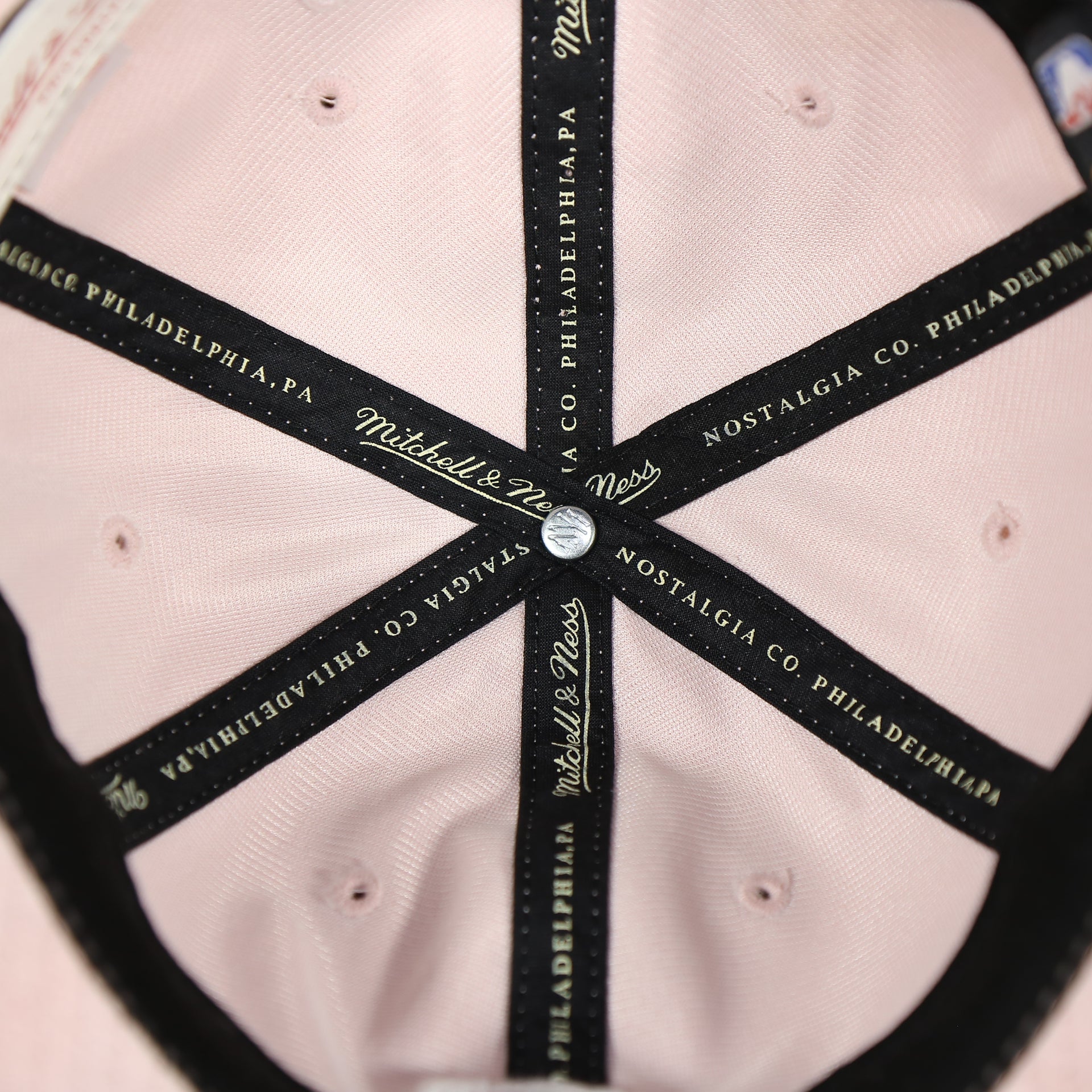 interior of the Cleveland Cavaliers Micro Suede Pink Dad Hat