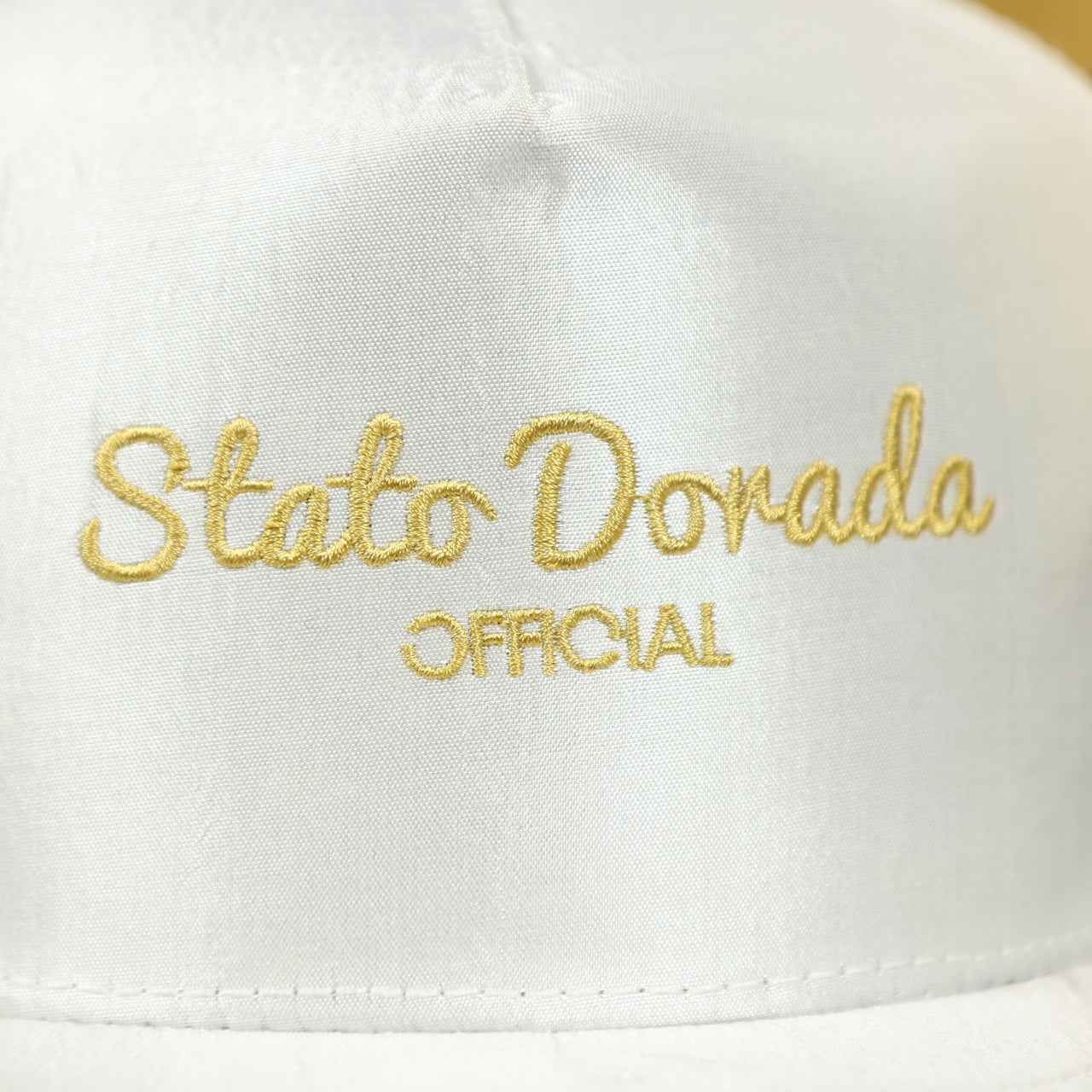 stato dorada script on the Official Stato Dorado Blanco Satin Snapback Hat