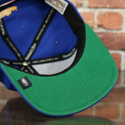 under side of the Golden State Warriors The City Logo Adjustable Snapback with Green Under visor | Blue OSFM