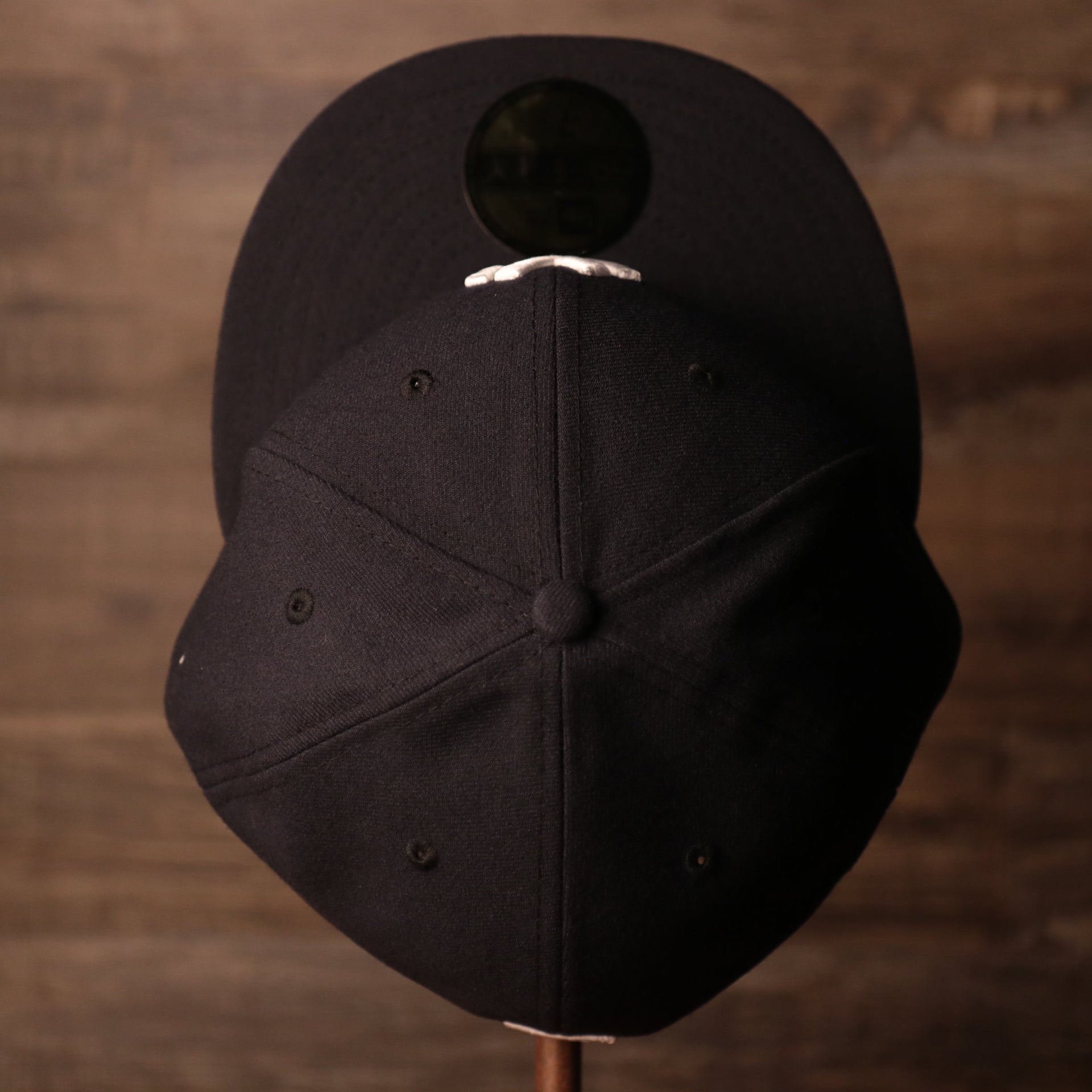 Yankees Black Bottom Fitted Cap | New York Yankees On-Field Black Underbrim Fitted Hat the top of this yankees fitted cap is black with a black button