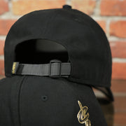 adjustable strap on the Cleveland Cavaliers 2017 NBA On Court Player Worn Black and Gold 920 Dad Hat