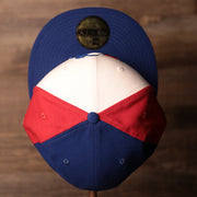 The  crown of this vintage New Era 59fifty shows the three colors and the cool design of this Montreal Expos fitted cap.