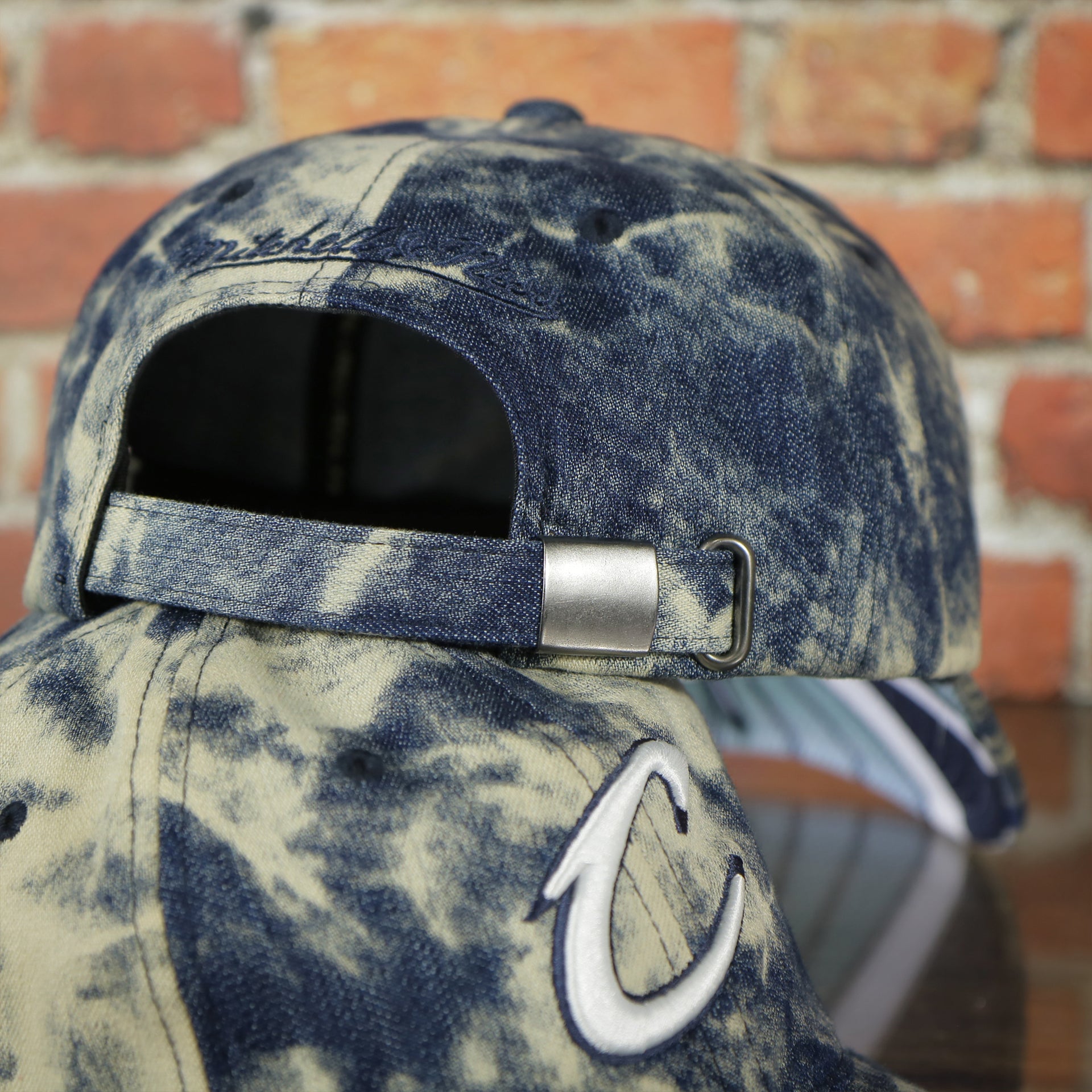 adjustable strap on the Cleveland Cavaliers Acid Wash Denim Dad Hat