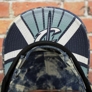 under visor of the Cleveland Cavaliers Acid Wash Denim Dad Hat