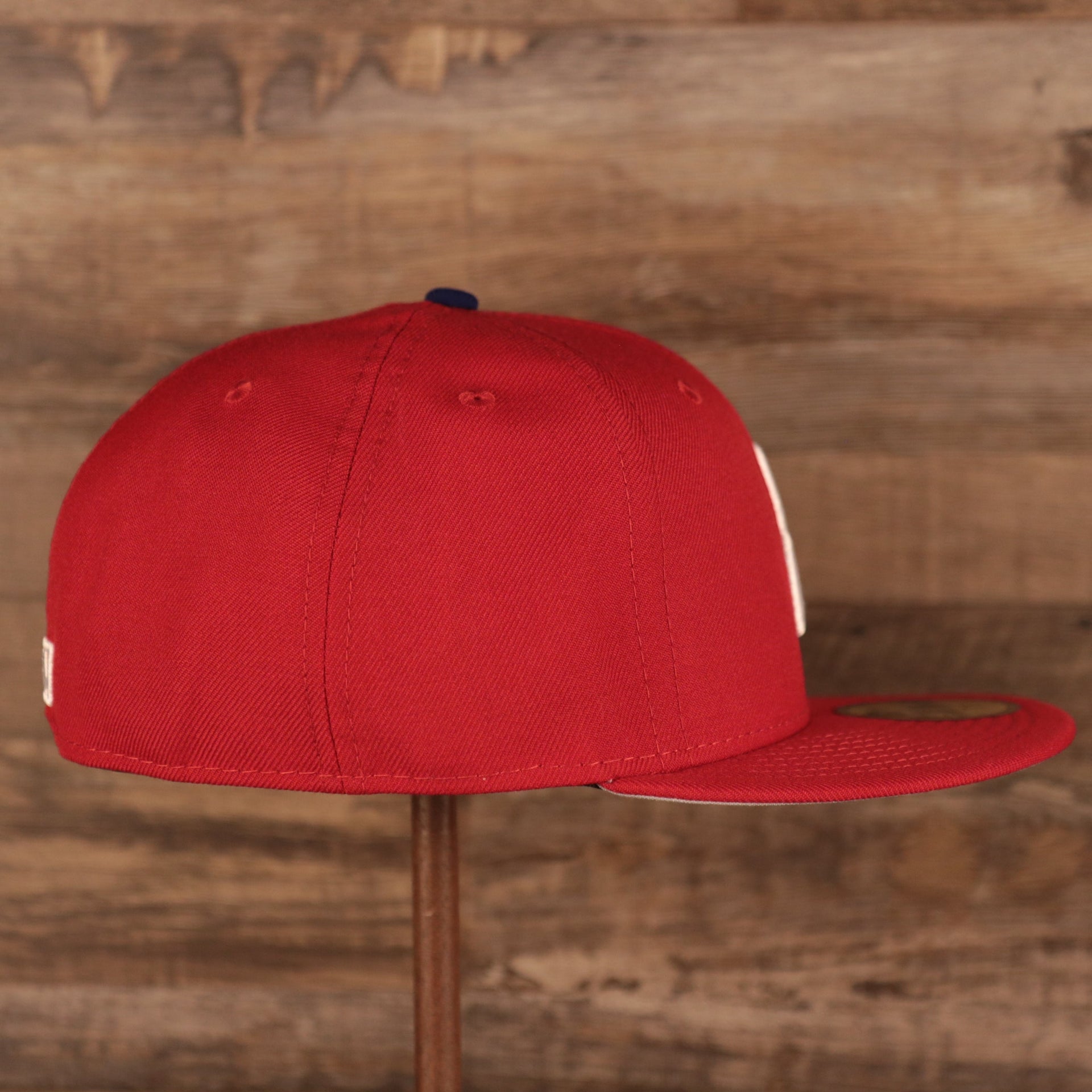 Wearer's right of the Philadelphia Phillies Upside Down Logo Gray Bottom 59Fifty Fitted Cap