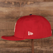 Wearer's left of the Philadelphia Phillies Upside Down Logo Gray Bottom 59Fifty Fitted Cap