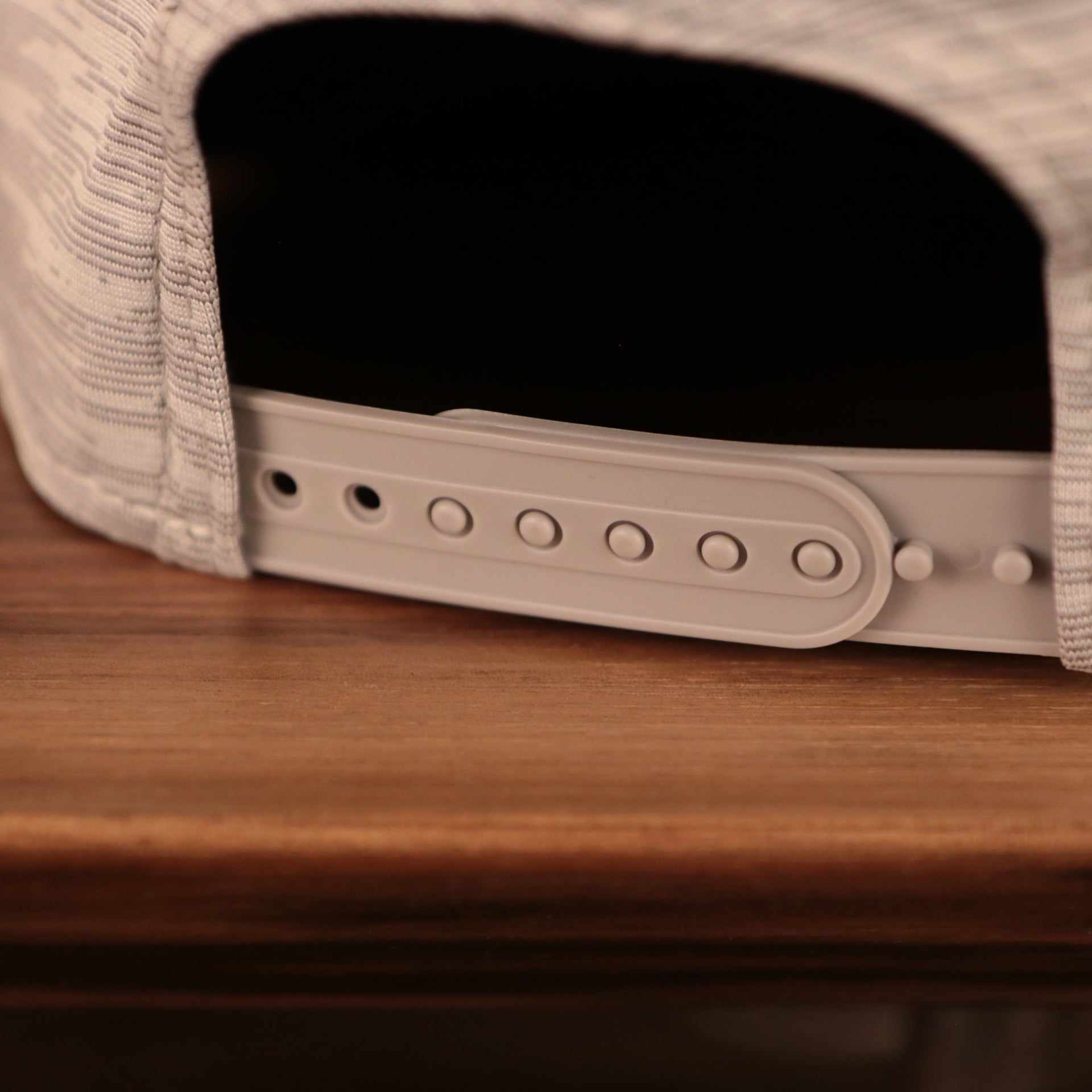 A closeup shot of the back view of the 2021 nfl on field snapback hat.