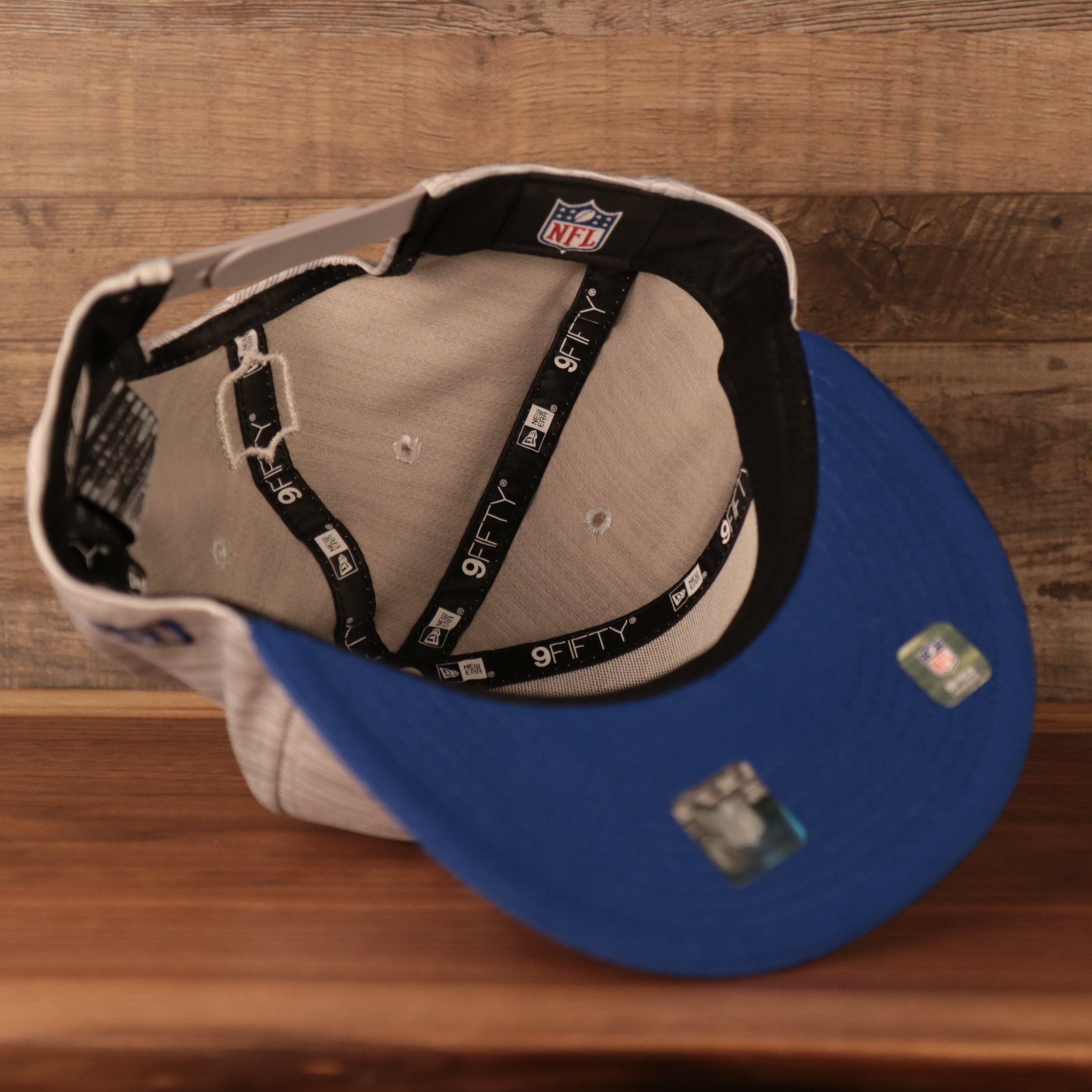 The NFL patch inside the 2021 nfl on field snapback hat.