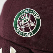 Close up of the 50th Year side patch on the New York Yankees Cooperstown 50th Year Side Patch Dark Green UV 59Fifty Fitted Cap | Vintage Christmas Movie Pack
