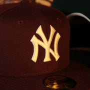 Close up of the Yankees logo on the New York Yankees Cooperstown 50th Year Side Patch Dark Green UV 59Fifty Fitted Cap | Vintage Christmas Movie Pack