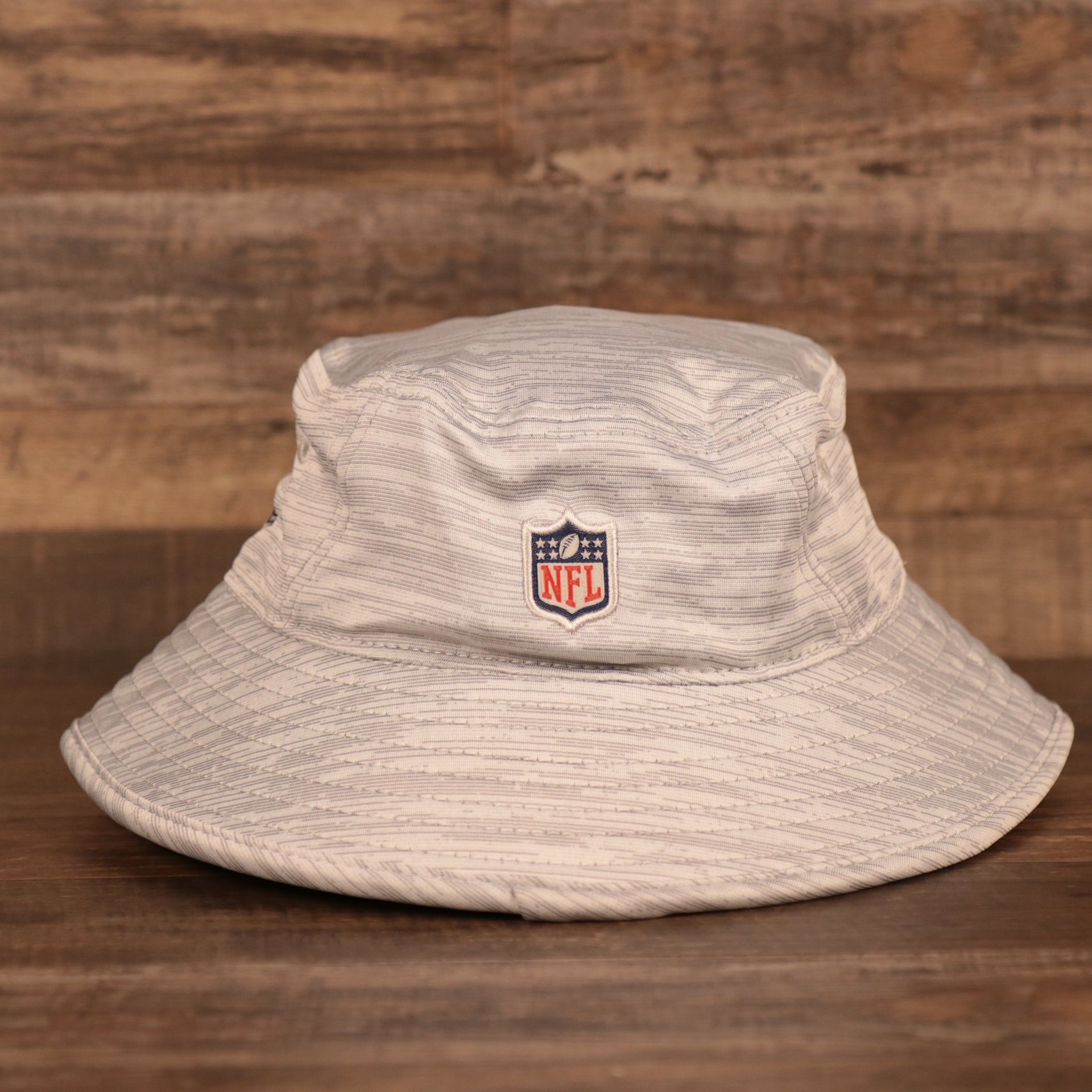 The NFL logo on the back of gray New Era 2021 nfl training bucket hat.