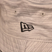 A closeup shot of the New Era patch on the side of the 2021 nfl on field bucket hat.