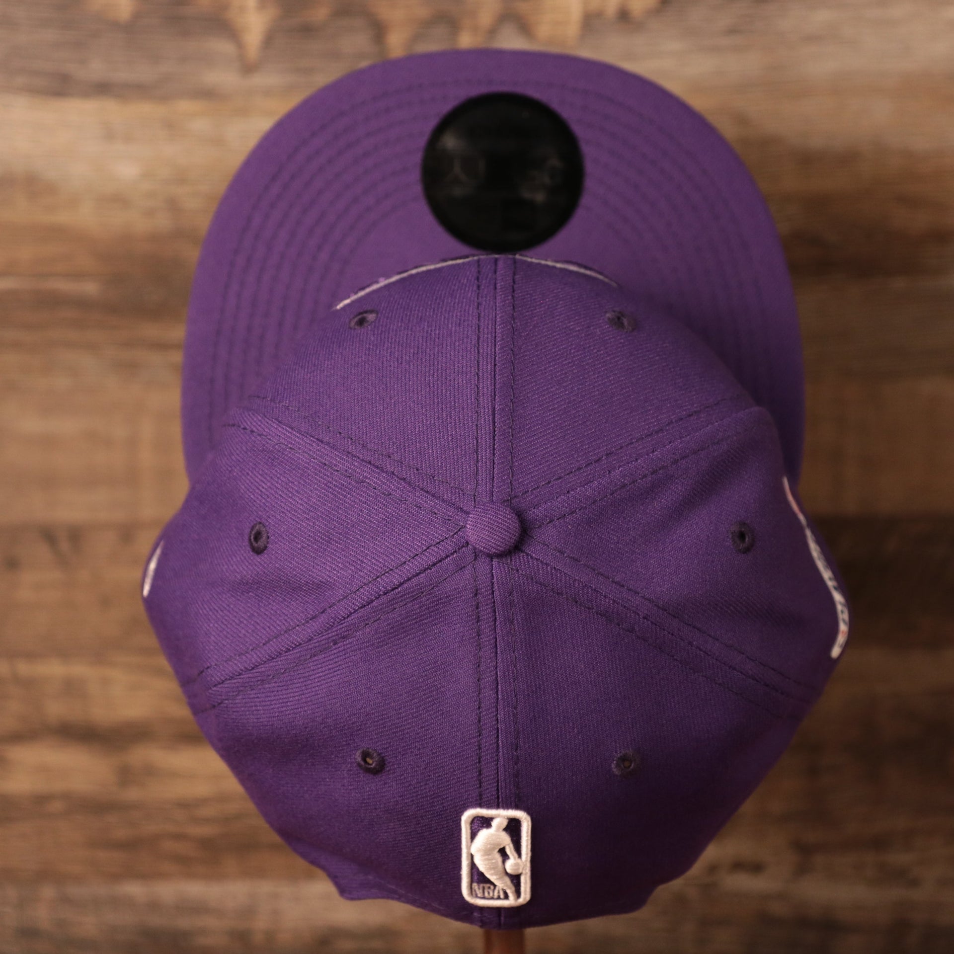 top of the Los Angeles Lakers 2021 NBA Playoff Side Patch Purple 9Fifty Gray Bottom Snapback Hat