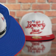 blue under visor on the Philadelphia 76ers 2022 City Edition City Of Brotherly Love Blue Bottom 59Fifty Side Patch Fitted Cap | New Era, White