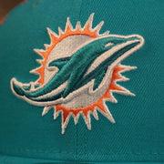 dolphins logo on the Miami Dolphins x Gatorade Red 9Fifty Grey Bottom Snapback