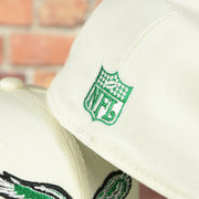 NFL logo on the Philadelphia Eagles Throwback Logo Veterans Stadium Side Patch Chrome Green UV 59Fifty Fitted Cap