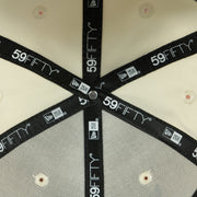 new era taping on the Philadelphia Eagles Throwback Logo Veterans Stadium Side Patch Chrome Green UV 59Fifty Fitted Cap