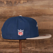 Wearer's right of the Baltimore Colts 1961-1978 Throwback Logo Vintage NFL 9Fifty Snapback Hat