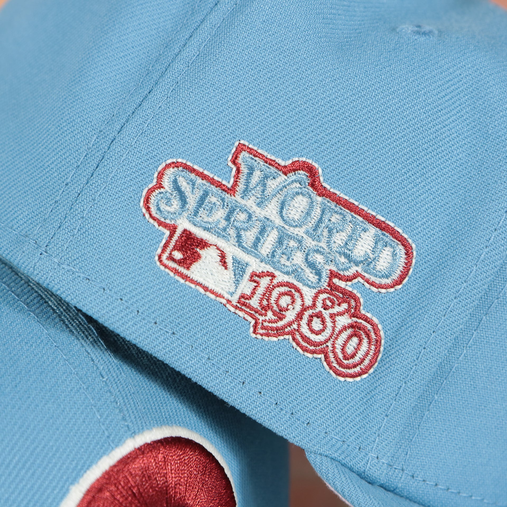 1980 world series patch on the Philadelphia Phillies 1980 World Series Glow In The Dark Pink Brim 59fifty Fitted Cap | Sky Blue