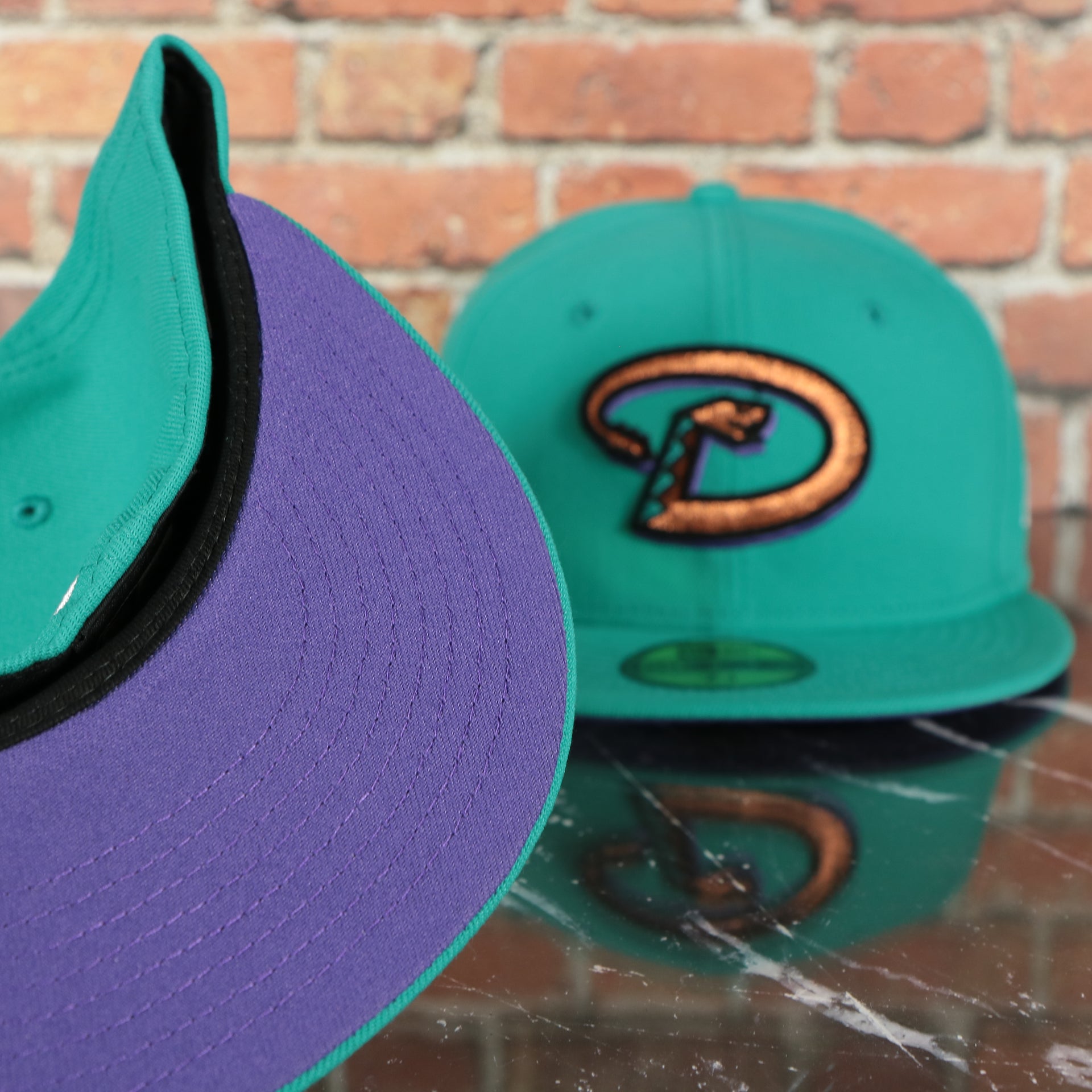 purple under visor on the Arizona Diamondbacks 2001 World Series Purple Bottom 59fifty Fitted Cap | Teal