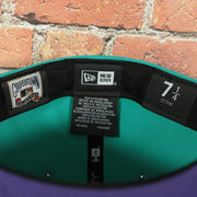 new era label on the Arizona Diamondbacks 2001 World Series Purple Bottom 59fifty Fitted Cap | Teal